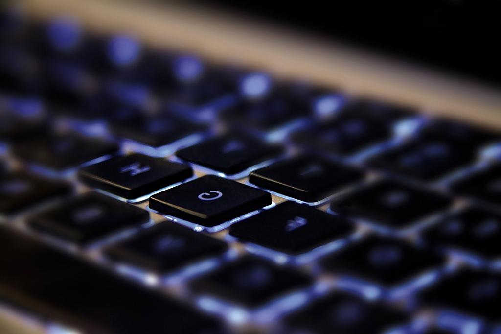 Technician troubleshooting PC hardware components