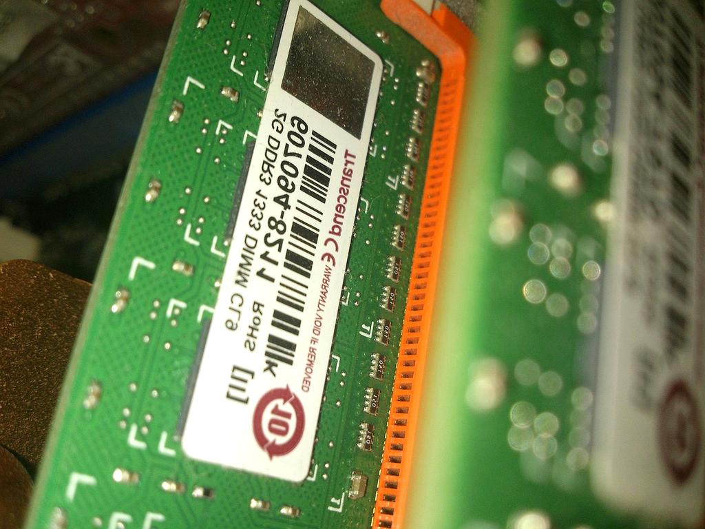 Close-up of RAM installation into motherboard